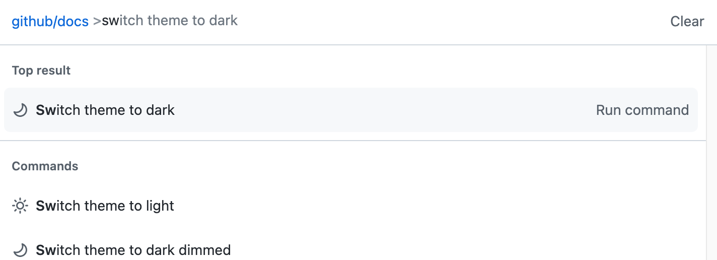 Command palette with the query switch theme to dark after a > prefix; a Top result row reads Switch theme to dark with Run command, followed by a Commands group with light and dark dimmed themes.