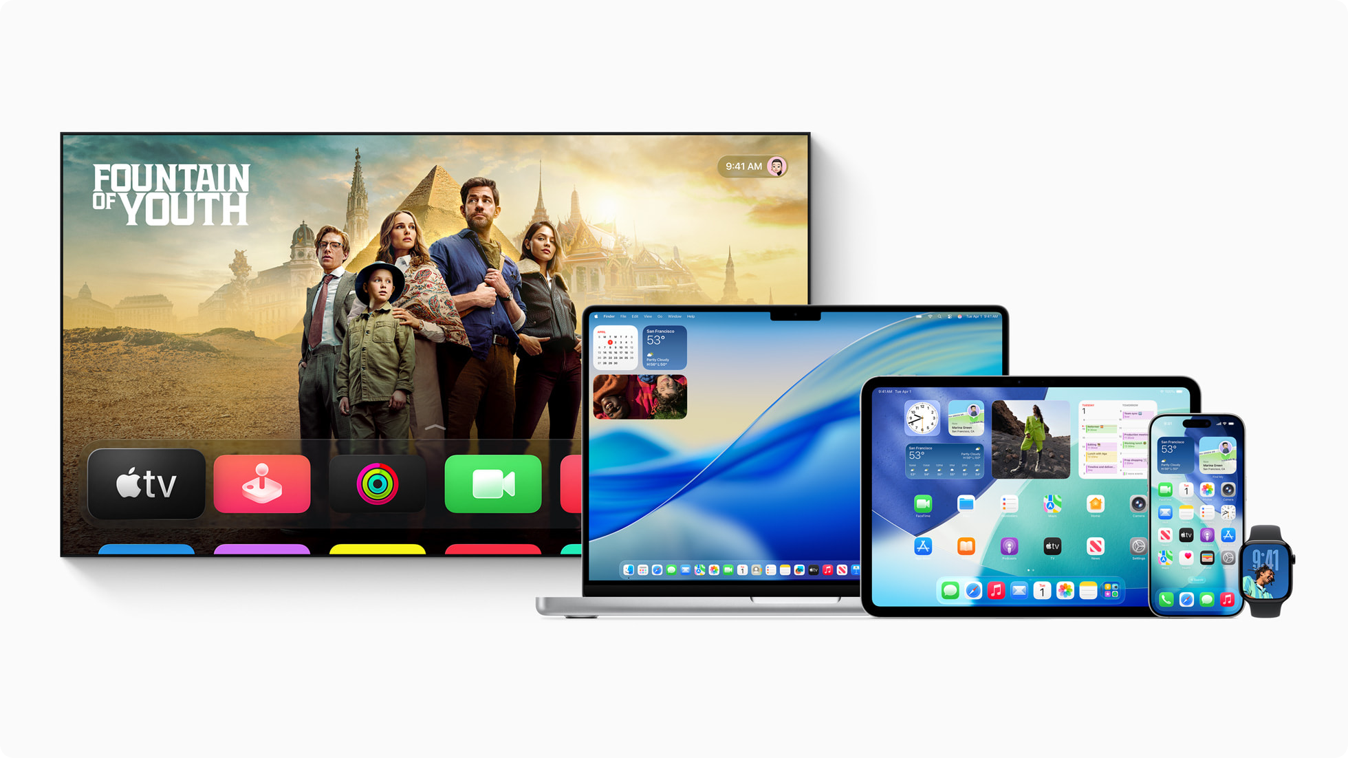An Apple TV, MacBook, iPad, iPhone, and Apple Watch all showing the Liquid Glass redesign.